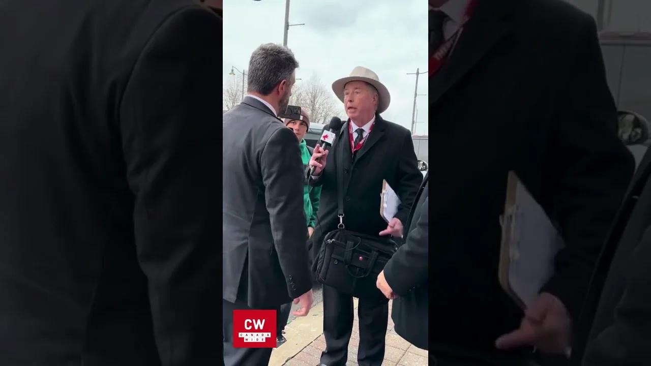 Another angle. Reporter gets arrested.