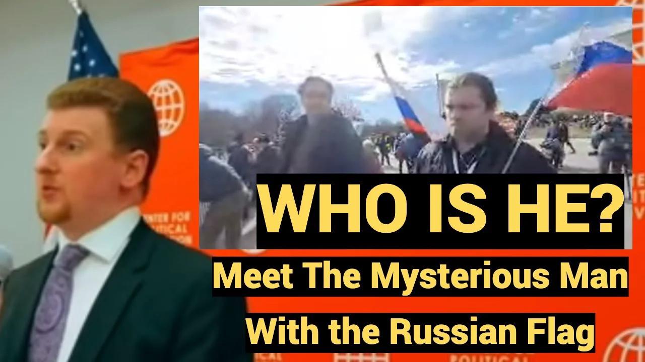 WHO IS HE? Meet The Mysterious Man With The Russian Flag