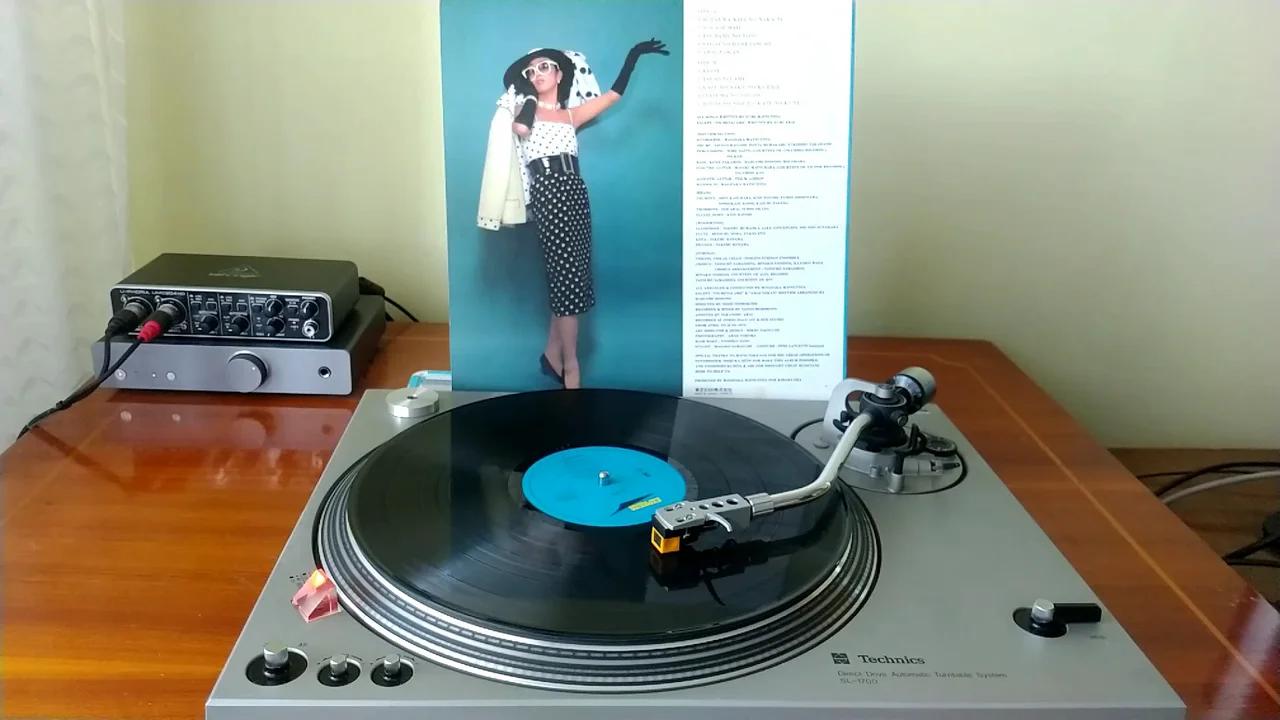 松任谷由実 (Yumi Matsutōya) りんごのにおいと風の国 (The Smell of Apples and the Windy