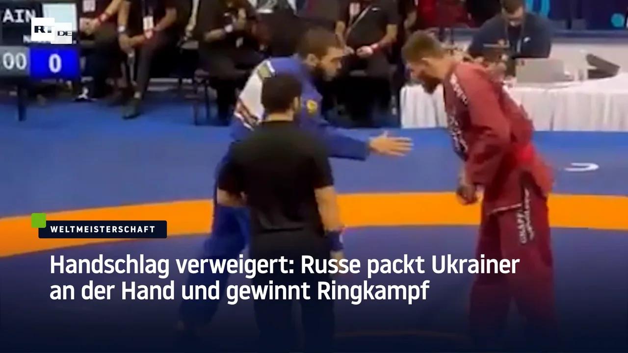 ⁣Handschlag verweigert: Russe packt Ukrainer an der Hand und gewinnt Ringkampf