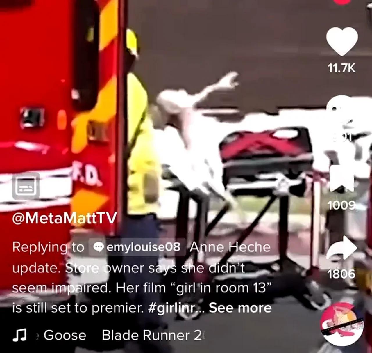 Anne Heche trying to escape from stretcher after car accident street
