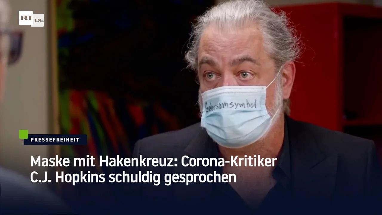 ⁣Maske mit Hakenkreuz: Corona-Kritiker C.J. Hopkins schuldig gesprochen