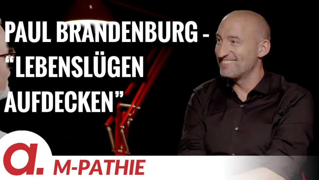 ⁣M-PATHIE – Zu Gast heute: Paul Brandenburg “Lebenslügen aufdecken”